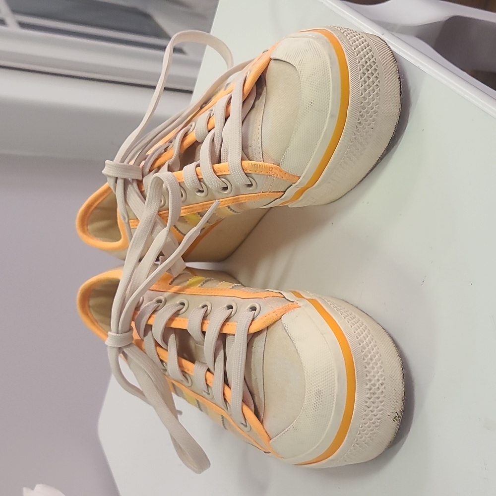 Off-White Canvas Sneakers with Vibrant Accents and Rubber Sole
